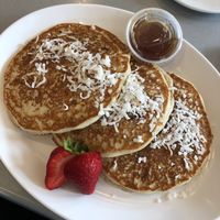 Vegan Pancakes with shredded coconut and  sugar free syrup.  at Gourmet Garden Cafe & Juices in Fort Lauderdale
