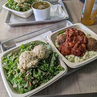 Kale Caesar salad and zucchini Alfredo type thing topped with chili at Plant Wise in Dix Hills