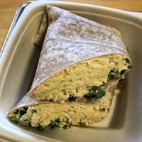 "Big Kahuna" - chick pea tuna salad wrap with dried cranberries and kale.  Filling! at Plant Wise in Dix Hills