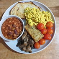 Build your own Breakfast (2pcs sourdough, Tofu scramble, Organic mushrooms, Hash Brown, Roast tomatoes, Beans) $30.50 at Wild Thyme Cafe in Bright