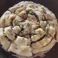 Cauliflower pizza - little flavor overwhelmed by the too soft buckwheat crust  at Moksa in Ubud