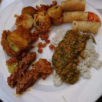 The variety of warm dishes. at Komkommertijd in Ghent