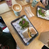 Breakfast burrito w/ oat latte   at Sweet Beat Cafe in Sligo