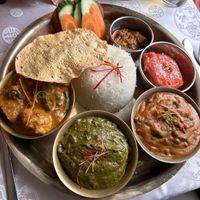 Thali (Kalo Dal, Mismas Tarkari, Tofu Palungo, Laalmohan)  at Namaste Nepal in Chemnitz