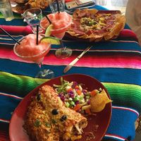 Vegan burrito + nachos with frozen watermelon cocktails :)  at Montezuma's in Crows Nest