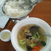 vegetables soup and a pot of steamed rice  at Lanmadaw Vegetarian Restaurant in Yangon