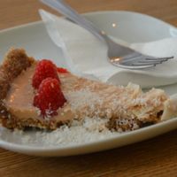 Coconut cheesecake with raspberries at Pastva in Prague