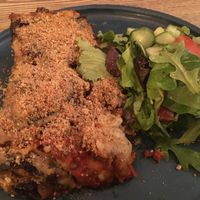 Vegan lasagna and salad at Pastva in Prague