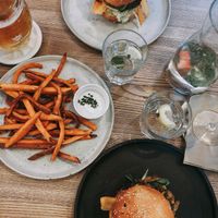 Jamaican jackfruit burger and green burger with sweet potato fries and chives mayo at Pastva in Prague