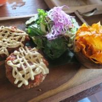 Veggie Schnitzel with Tomato and Cashewsauce, Sweetpotatoechips at Pels Supershop in Tibubeneng