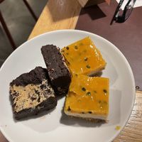 Peanut butter brownie and passion fruit cheesecake   at Tibits in Luzern