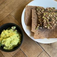 Guacamole with gluten-free crackers   at Ecru in Rome