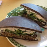 Sandwich with burger patty at Ecru in Rome