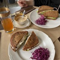 Sandwiches with burger patties, coffee with handmade almond milk, ginger soda   at Ecru in Rome