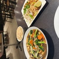Vegan pad Thai with Crispy chicken and tofu veggies with rice  at Veganic Thai Cafe in San Diego