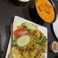 Pineapple fried rice with soy duck and Panang curry with soy chicken   at Veganic Thai Cafe in San Diego