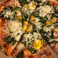 Red sauce, spinach & banana peppers  at Pizza Studio in Tukwila