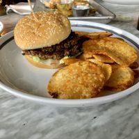 Babylon Burger and homemade chips at Kindred in San Diego