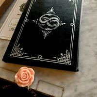 The check came in this book! at Kindred in San Diego