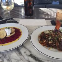 Beet risotto with ";potato scallops"; and maitake mushrooms with farro - really good! at Kindred in San Diego