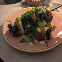 Two of their 'meat' onna stick options at Kindred in San Diego