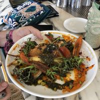 something with carrots and rice thing on bottom with pan fried tempeh I believe! at Kindred in San Diego