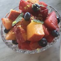Sensational fruit side (peaches, blueberry, mint, lemon zest) at Kindred in San Diego