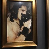 Fabio holding my cat at Kindred in San Diego