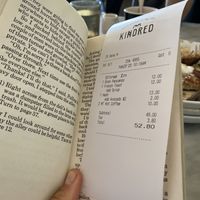 Love how they present your bill! - in a book 📖  at Kindred in San Diego