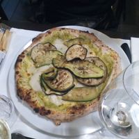 This is their vegan pizza!
It's a pizza bianco and is already vegan on the menu, no need to adapt anything! Rice based mozzarella at La Capannina in Turin