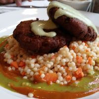 Tempeh crab cakes and Israeli couscous at Wild Rice Vegan Cafe in Watertown
