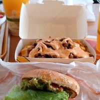 Black Bean Guac Burger/Iconic spuds at Plant Power Fast Food - Ocean Beach in San Diego