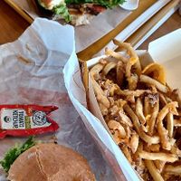 Feasting so hard at Plant Power Fast Food - Ocean Beach in San Diego