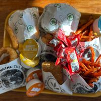 Onion Rings, Sweet Potato Fries, hash browns, sauces.  at Plant Power Fast Food - Ocean Beach in San Diego