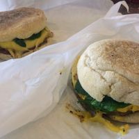 Breakfast sandwiches with vegan meats and non-dairy cheeses on English muffins at Plant Power Fast Food - Ocean Beach in San Diego