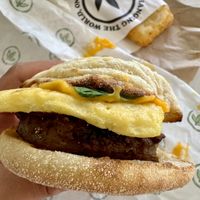 Sausage egg and cheese on an English muffinn  at Plant Power Fast Food - Ocean Beach in San Diego