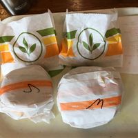 Chicken and waffles and sausage egg muffin at Plant Power Fast Food - Ocean Beach in San Diego