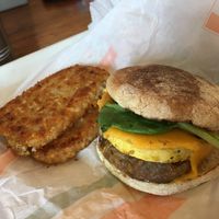 Sausage egg muffin and 2 hash browns  at Plant Power Fast Food - Ocean Beach in San Diego