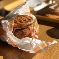 Chicken and Waffle Breakfast Sandwich with Maple Aioli and “Bacon"  at Plant Power Fast Food - Ocean Beach in San Diego