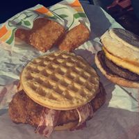 chicken & waffles & sausage, egg, & cheese muffin at Plant Power Fast Food - Ocean Beach in San Diego