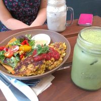 Vegetable fritters with homus & salad and drinking iced matcha & chai at Full Of Life Organics in Toowoomba