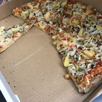 Vegan pizza with mushrooms olives and pineapple  at Veggie Flames - Brampton in Brampton
