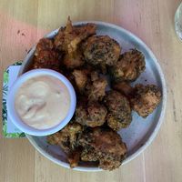 Tempura broccoli. Breading was SO GOOD!   at Nourish Bistro in Banff