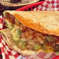 this is supposed to be a quesadilla - it was kinda lacking in flavour and structure. felt like a cheeze and ketchup wrap with added guacamole. not worth the money at all :( at Vx in Bristol