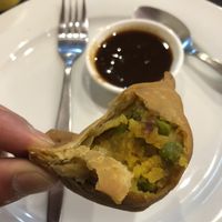 Samosa w/ tamarind sauce. at Muskaan K Indian Gourmet in Huntingdale