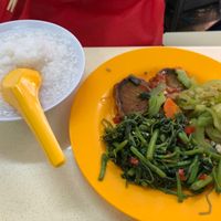 Porridge with sweet sour fish bitter gourd and spinach  at Mi Le Vegetarian 弥乐素食 in Central Singapore