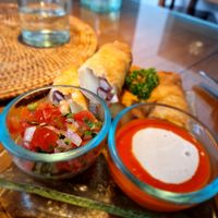 Kartoffeln, Bohnen im frietiertem teigmantel, einen leicht scharfen dip dazu. Mega lecker 😋 at Sage in Ubud