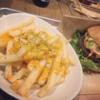 Cheesy fries and burger at Ain Soph.Ripple Kabukicho in Tokyo