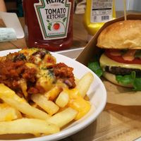 Chili fried potatoes with cheese, and cheese burger. at Ain Soph.Ripple Kabukicho in Tokyo