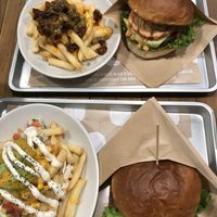 Vegan cheeseburgers with loaded fries and chili cheese fries at Ain Soph.Ripple Kabukicho in Tokyo